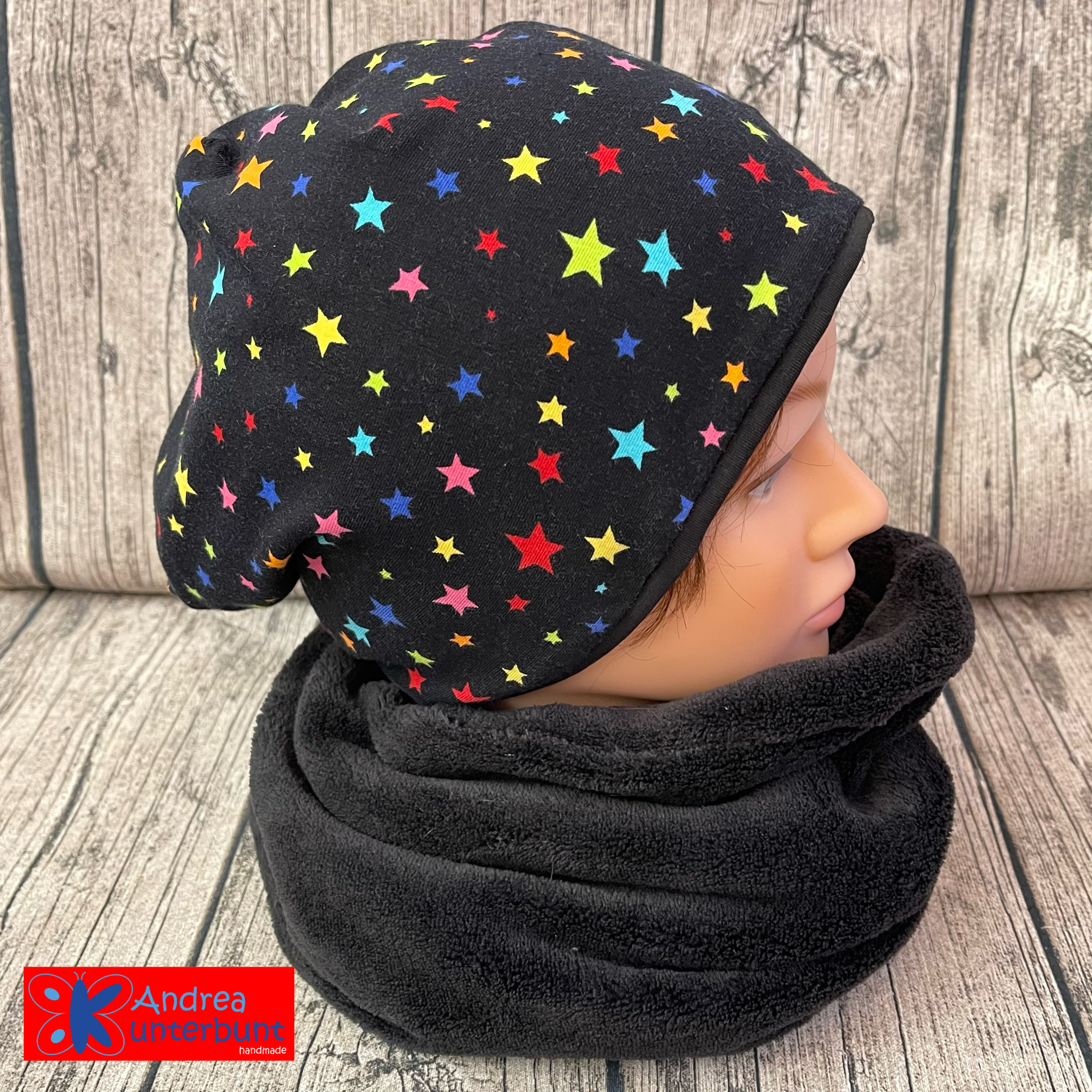 Wendebeanie bunte Sterne / schwarz